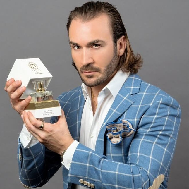 Argos Fragrances CEO Christian Holds Argos Perfume